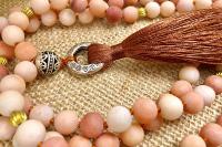 Collier mala rose pompon brun