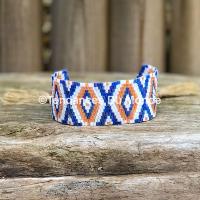 Bracelet manchette tissé orange et bleu