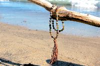 Collier pompon en cuir marron