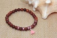 Bracelet en bois pompon rose