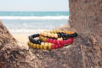 Bracelet en bois orange, noir et naturel