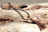 Collier pompon en cuir marron